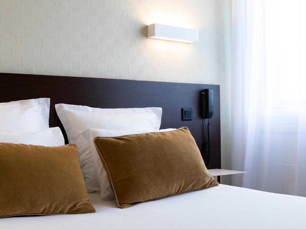 Chambre double standard tête de lit du Moka hôtel de Lorient